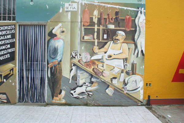 Painting on the wall outside a butcher shop