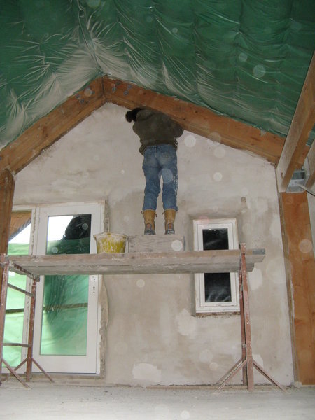 Wendy plastering the eaves