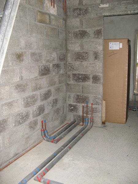  Grey wall and pipes