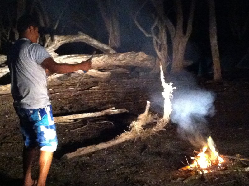 Jorge making fire 