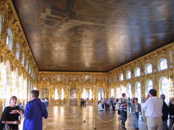 One of the Rooms of the Summer Palace, Pushkin. Our lovely guide Maree in the bottom left.