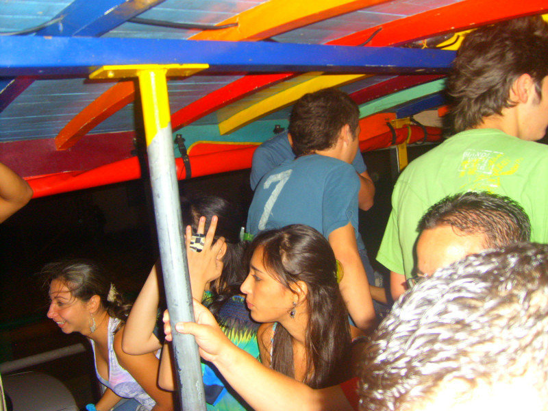 Partying inside the Chiva while its driving to a new town