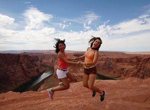 Zhara and I Jumping at the Horseshoe Bend