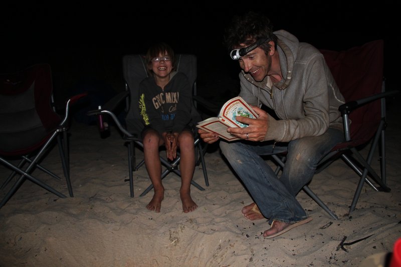 Readng stories around the campfire