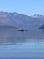 Some lucky bugger kayaking on a glass-like Lake Wanaka