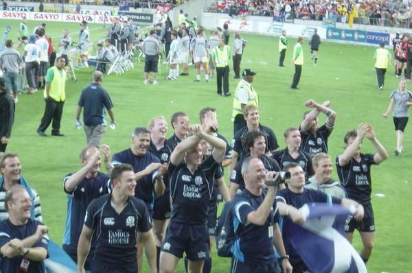 The Scots enjoy some banter with the crazy crowd on their 'victory' parade
