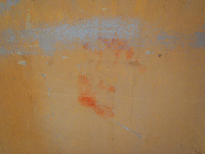 Bloody hand print on the wall
