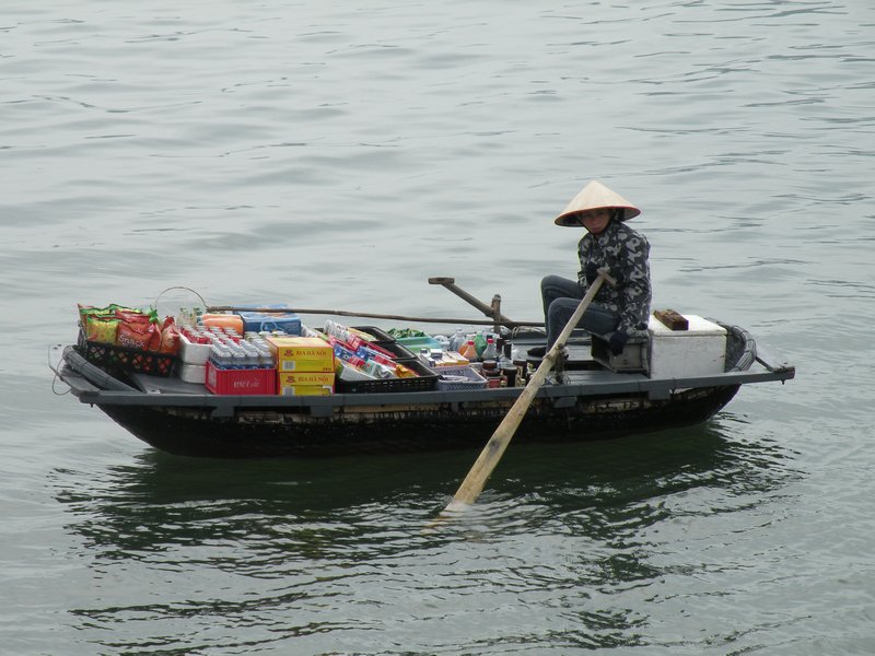 Vietnamese woman on her boat