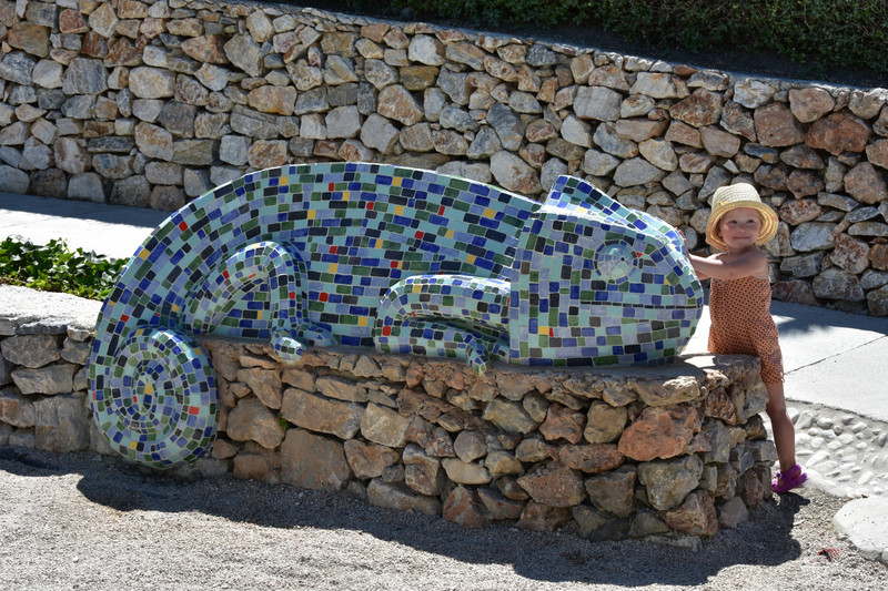 Little  Olive (granddaughter) discovers some colourful creatures in Frigiliana, Andalucia