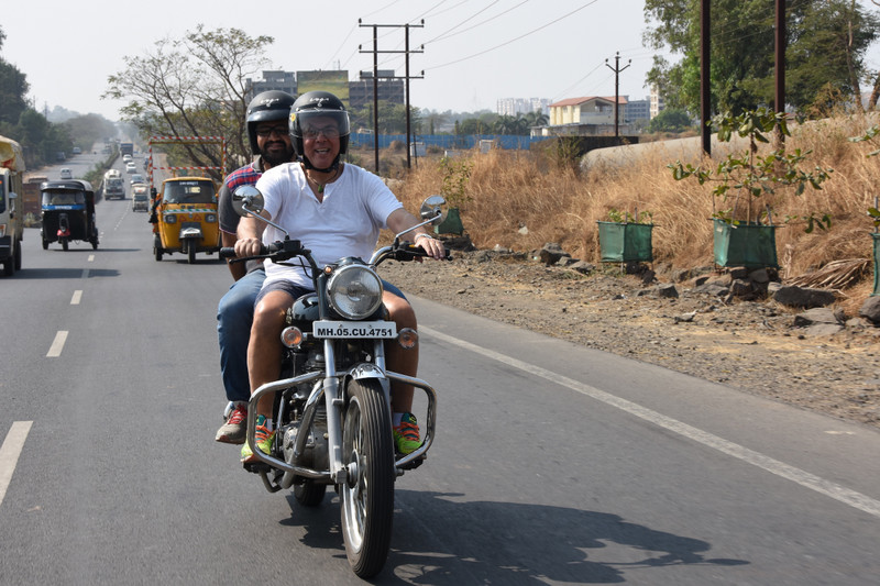 A life's ambition fulfilled. M on Swapnil's Royal Enfield bike, The Highway, Mumbai