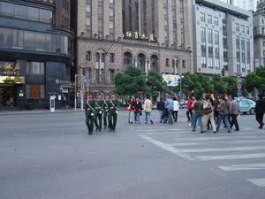 soldiers marching across road
