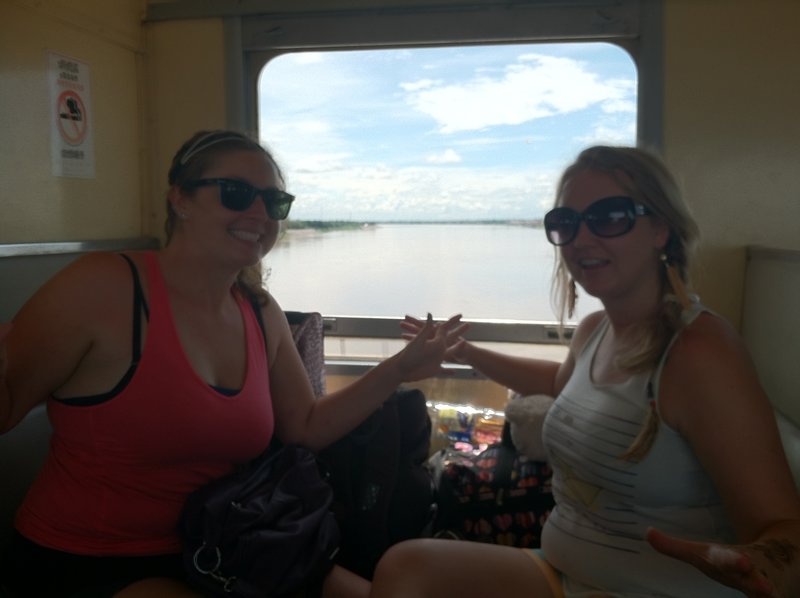 Alyssa and Katie crossing the Friendship bridge to Laos