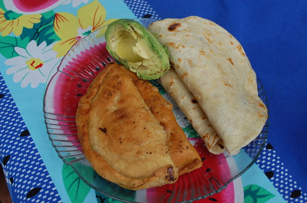 Honduran meal of baleadas and pastelitos de pina