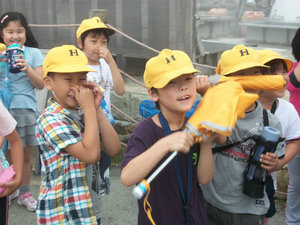 Schoolkids Shielding Their Noses From Sulphur Fumes