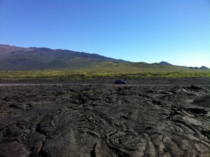 Lava field with Mauna Kea in the Background.