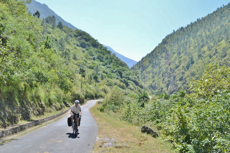 Mel cycling the Lhuntse valley