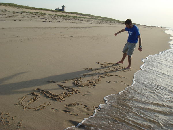 Keith writing my name in the sand
