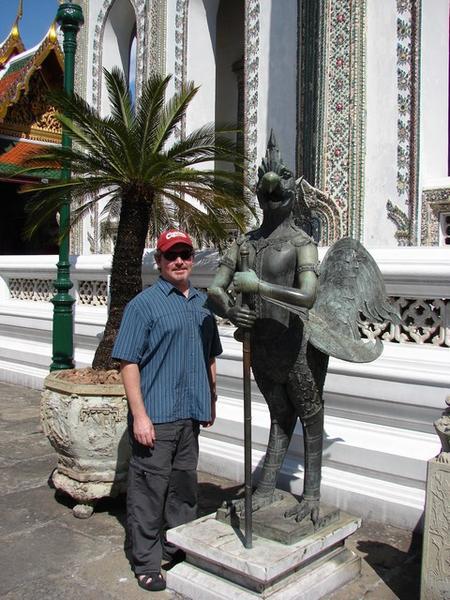 Scott with chicken guard @ The Temple of the Emerald Buddha