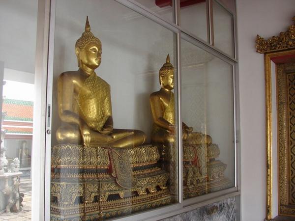 392 golden statues of Buddha in subduing Mara attitude