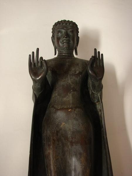 A standing buddha in the attitude of teaching