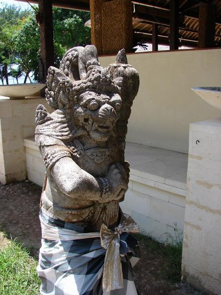 Statue at hotel with Gulangun wear