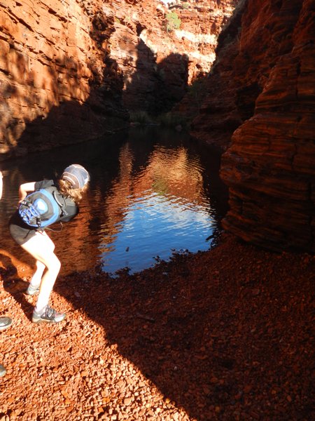 Skimming stones at the bottom of Hancock Gorge
