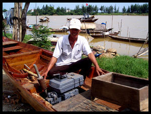 Duc in his newly built boat with its almost new motor