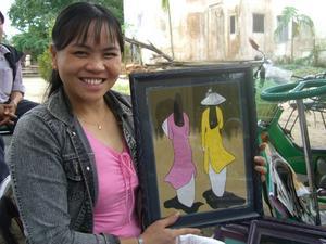 Trang shows her silk embroidery work