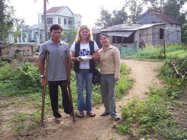Here I am with Hiep and Nhat (Vice President of the Disabled Group)