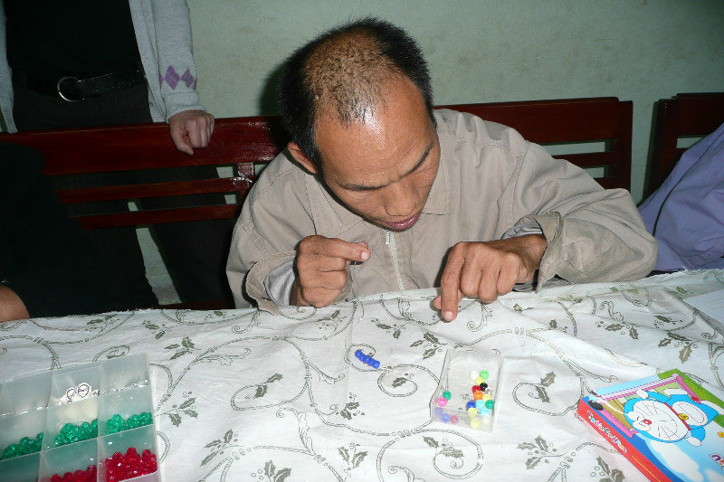 Quang determined to make a bracelet