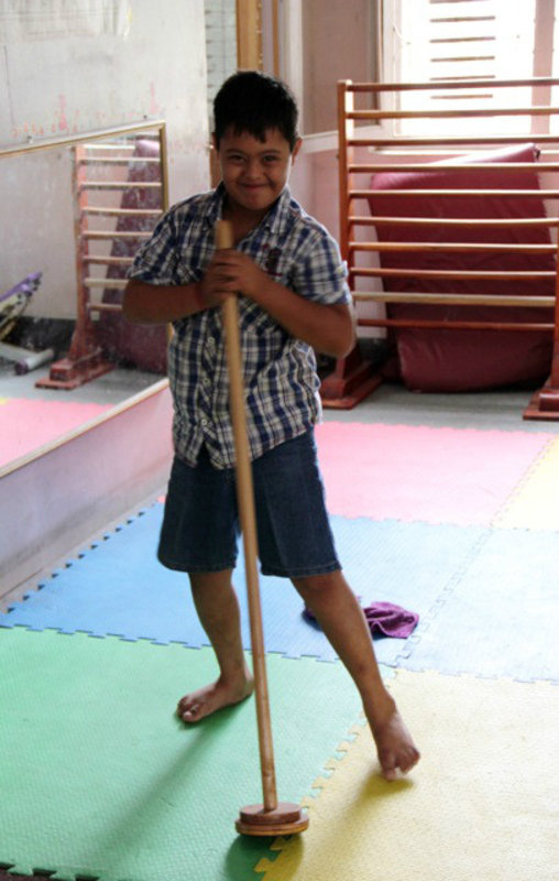 Dancing with a walking aid - an alternative exercise for fitness at the Special Education Rehabilitation Centre, Kathmandu, Nepal.