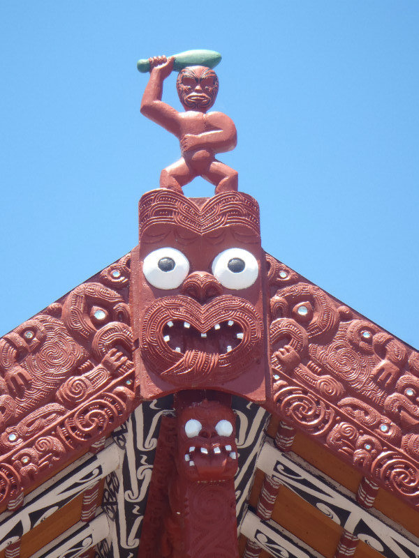 Tiki carving on a Maori meeting house