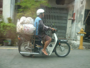 Carrying sacks of rice