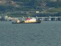 End of Pipeline - this tugboat rear escort to tanker leaving port