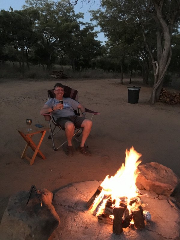 Camping bliss, beer & a fire