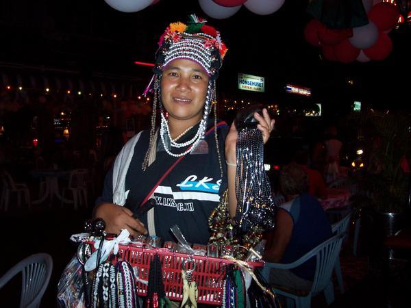 Thai mountain lady selling her handicraft