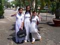 3 happy students in school uniform