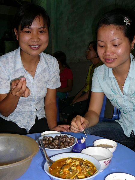 Lam & Chi and our Upe (river snail) snack