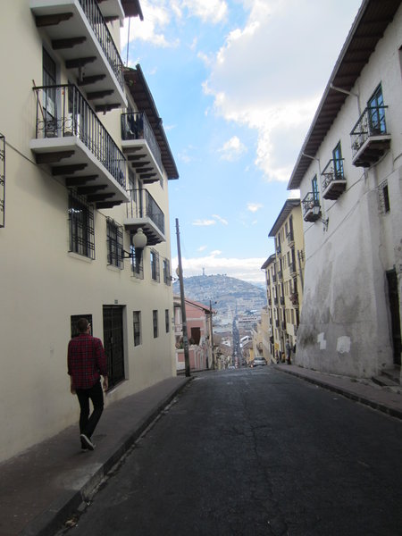 Sean walking through streets of Quito