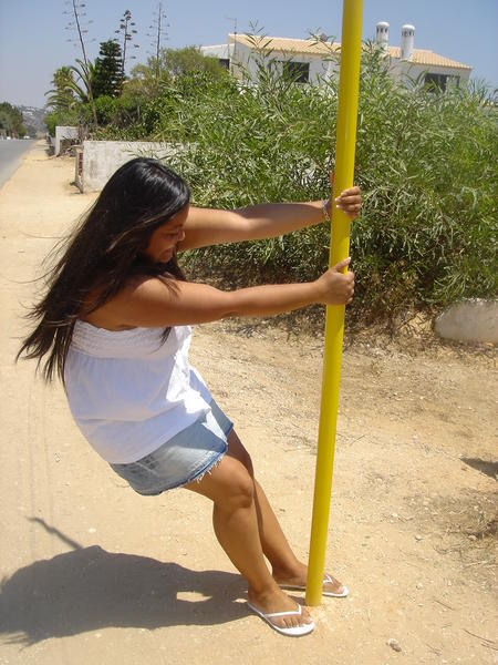 practising some pole dancing!