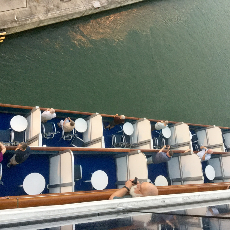 Passengers below us on their balconies 