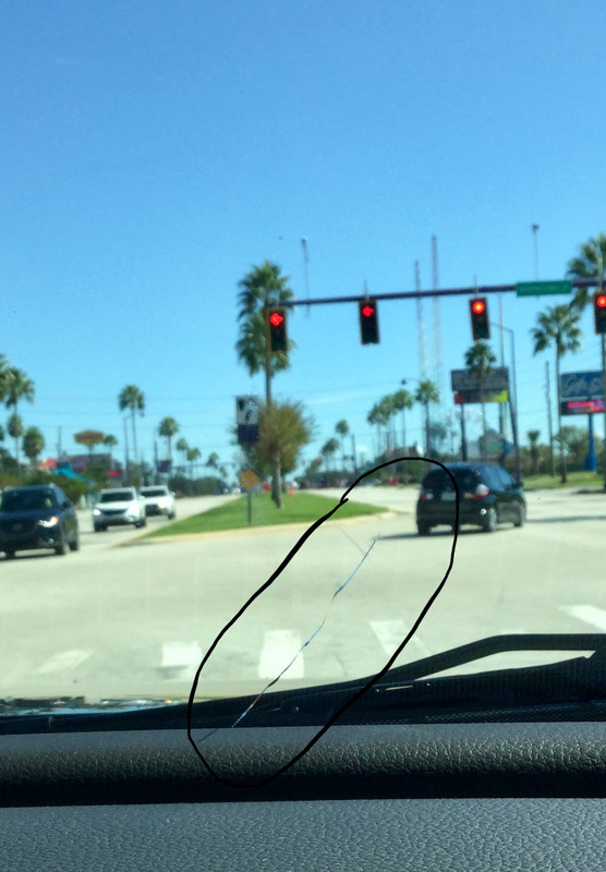 The crack in our car windshield- growing