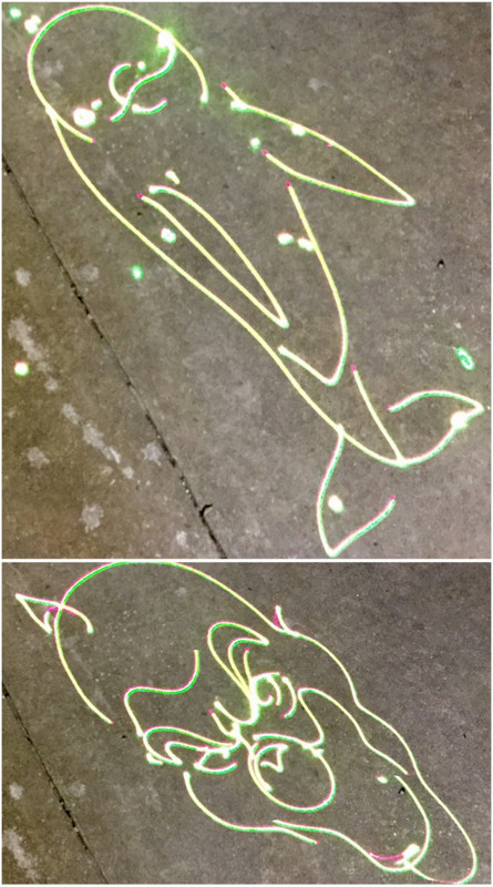 Laser designs on sidewalk