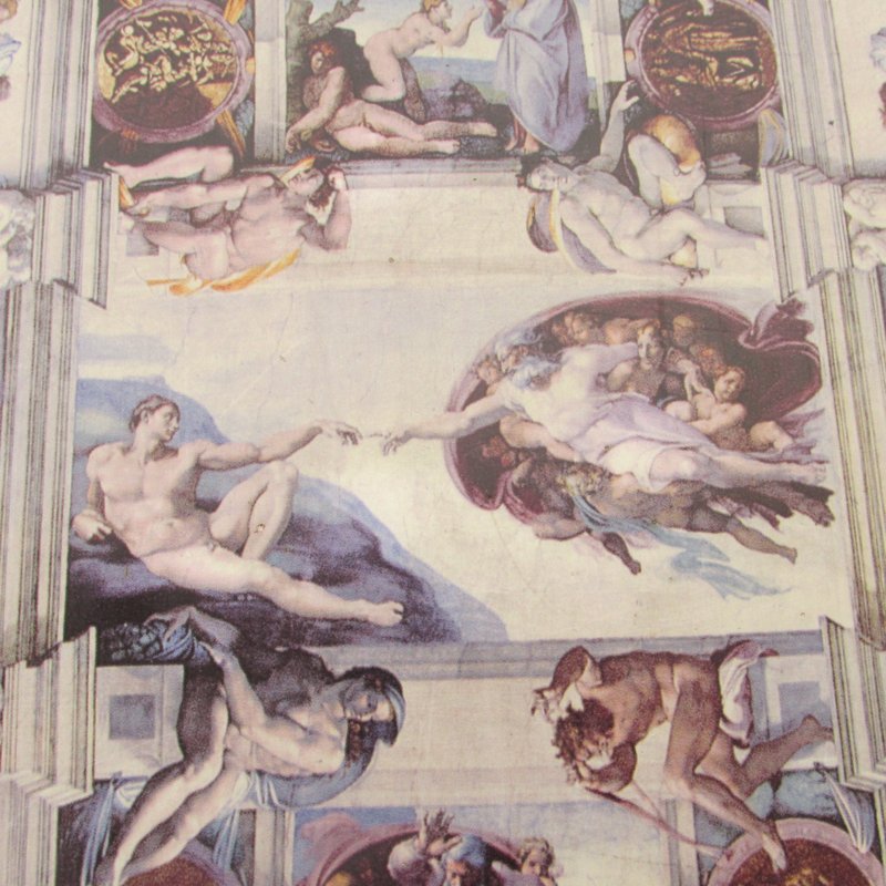 Michelangelo's Creation of Adam on the Sistine Chapel Ceiling