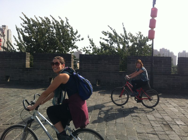 Kayleigh and Sharon on the wall bikes
