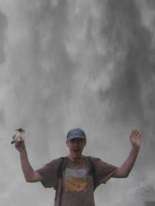 Chris and Bob get soggy in a waterfall at Iguazú