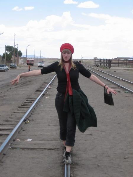 Karin walking along the tracks