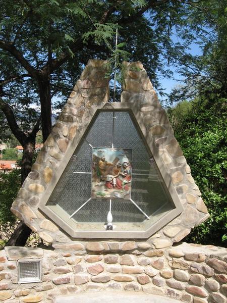One of many religious statues at cemetery