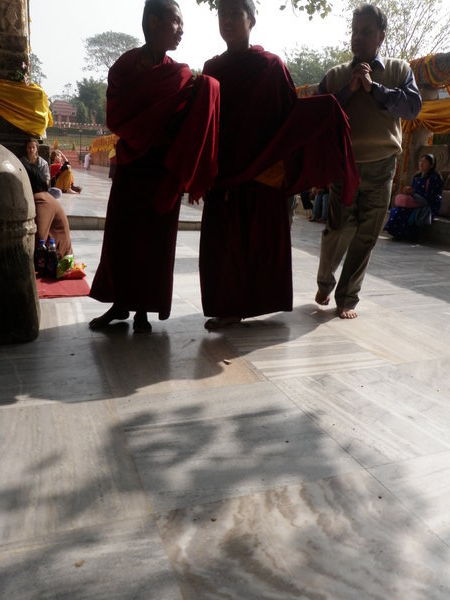 2 Young Monks making Kora around Temple