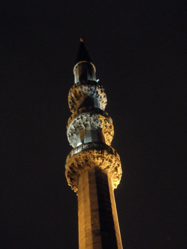 A minaret against the night sky